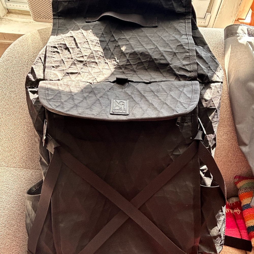 Large Black Backpack with Quilted Texture and Padded Straps